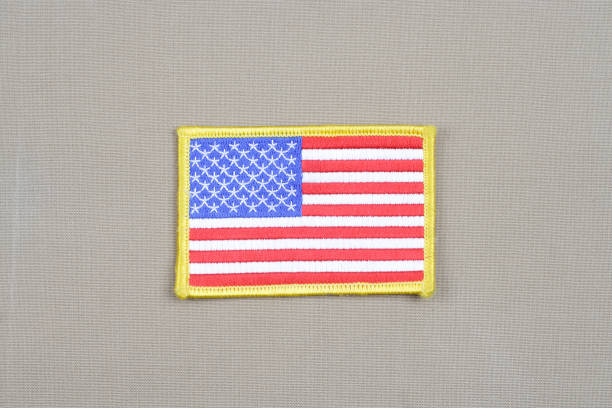 istock USA flag patch on desert camouflage uniform 1193904120