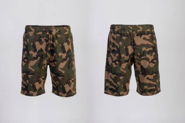 istock Sport shorts ,camo color, front and back view isolated on white. 1193904610