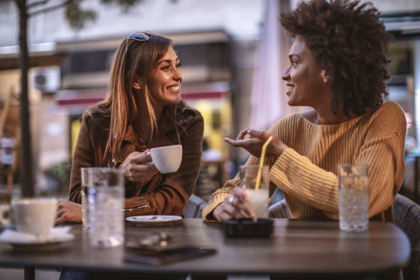 istock Best friends relax at cafe 1193905395
