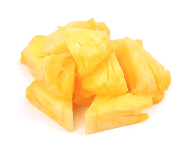 istock Fresh cut pineapple. Pieces isolated on white background 1193905502
