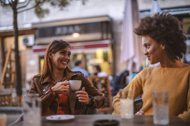 istock Best friends relax at cafe 1193905533