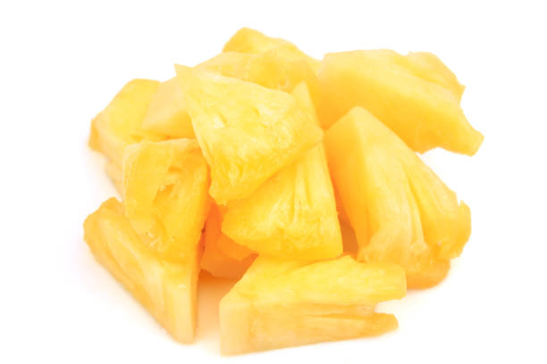istock Fresh cut pineapple. Pieces isolated on white background 1193905544