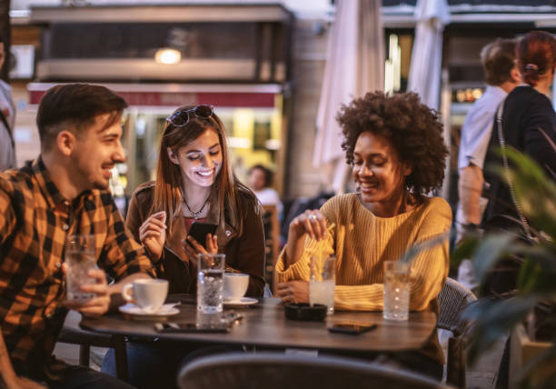 istock Friends talking and relax at cafe 1193905767