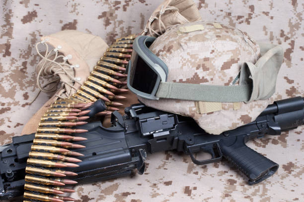 istock US Marines background concept with machine gun 1193906663