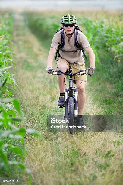 Mountain Biker Riding On Bicycle Stock Photo - Download Image Now - Activity, Adult, Aerobics