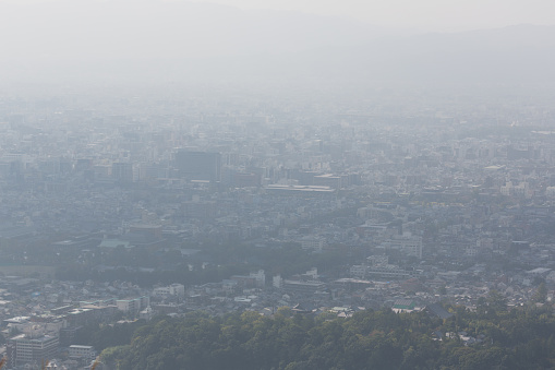 Air Pollution, Haze covers the Kyoto Skyline in Japan.