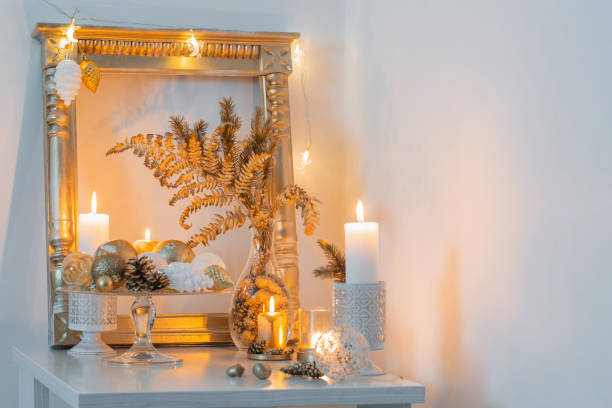 istock Christmas golden decor in white interior 1193911095