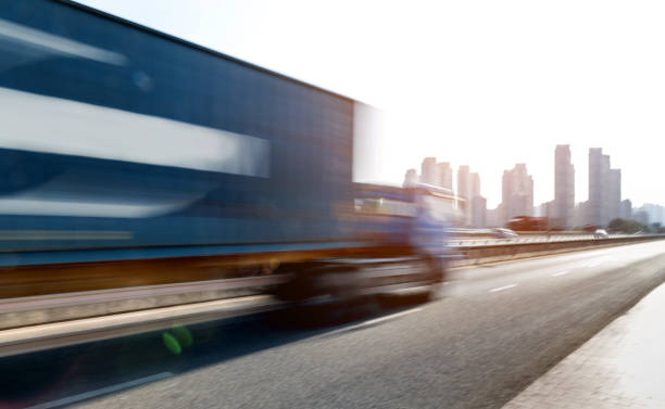 istock Truck speeding on city viaduct 1193912906