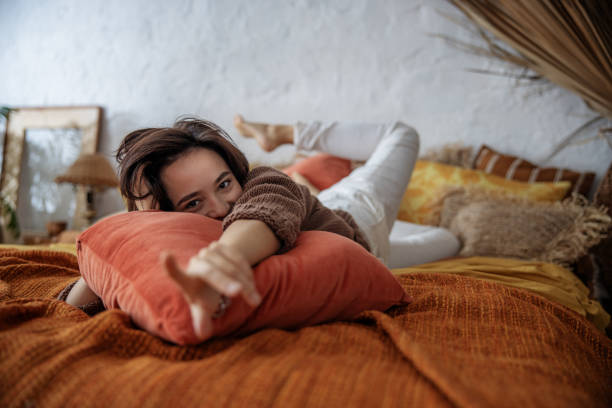 istock Happy woman is pointing at camera by hand 1193913816