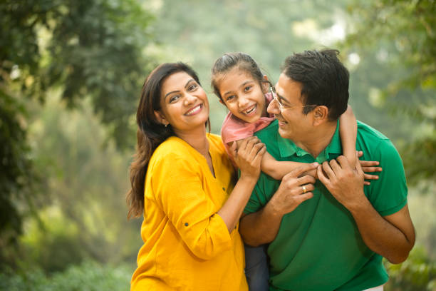 istock Happy family at park 1193915887