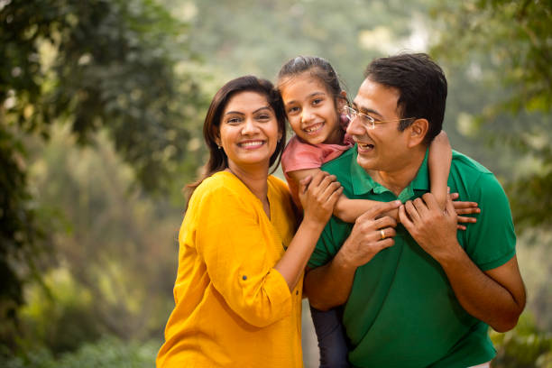 istock Happy family at park 1193915915