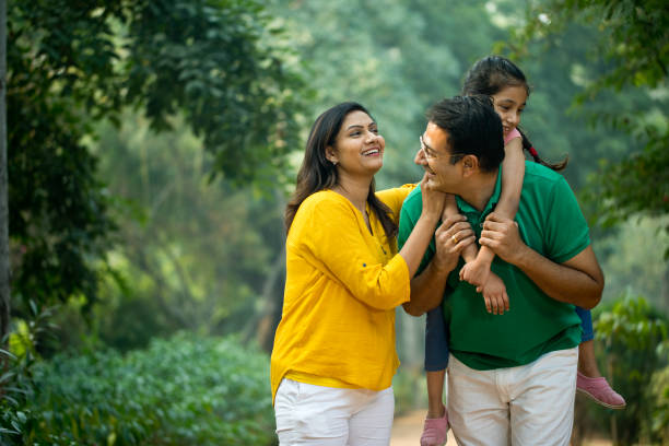 istock Happy family at park 1193915941