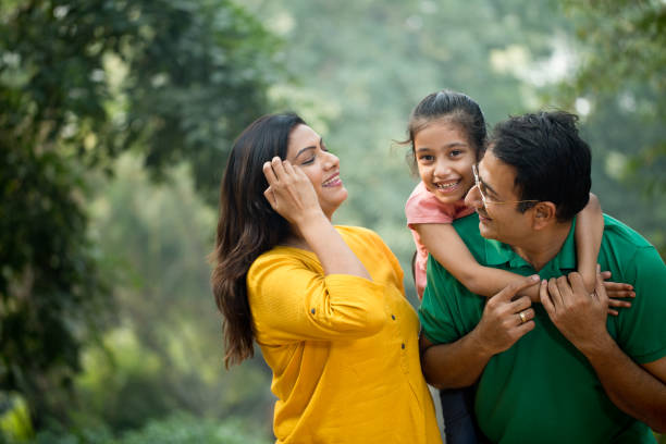 istock Happy family at park 1193915961