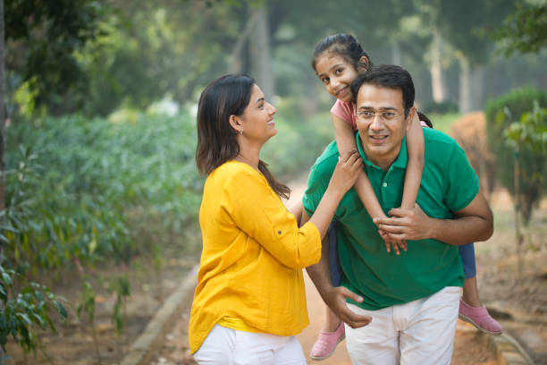 istock Happy family at park 1193916126