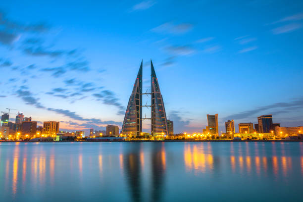 Sunrise over skyline in Bahrain city Bahrain skyline over sea view and sunrise sky background. bahrain stock pictures, royalty-free photos & images