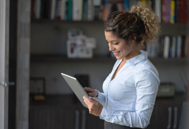 istock Business woman working online on a digital tablet 1193924013
