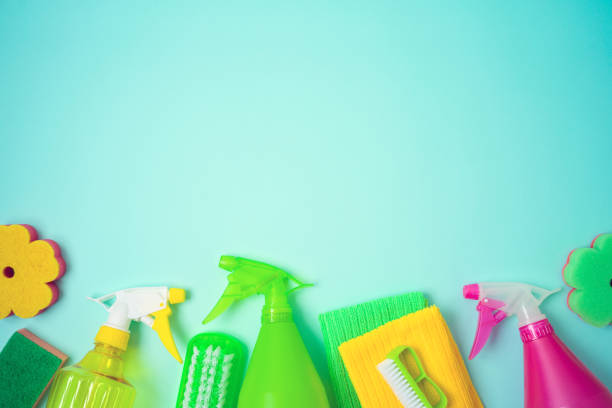istock Spring cleaning concept with supplies over blue baclground. Top view from above 1193925606