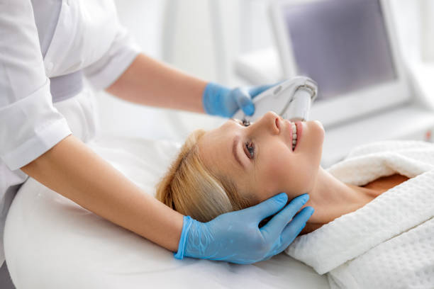 istock Adult lady looking on beautician during procedure 1193929548
