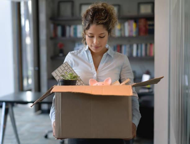 istock Business woman getting fired from her job 1193929670