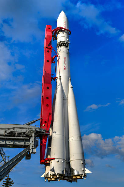 Pipes and floodlights on the background of the blue sky. city. Landscaping. Heating.