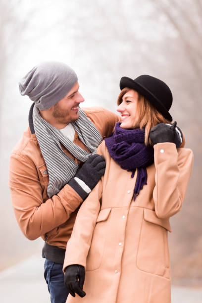 istock Couple enjoying outdoors in cold autumn / winter time. 1193950258