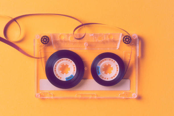 istock reel music tapes on a yellow background 1193950352