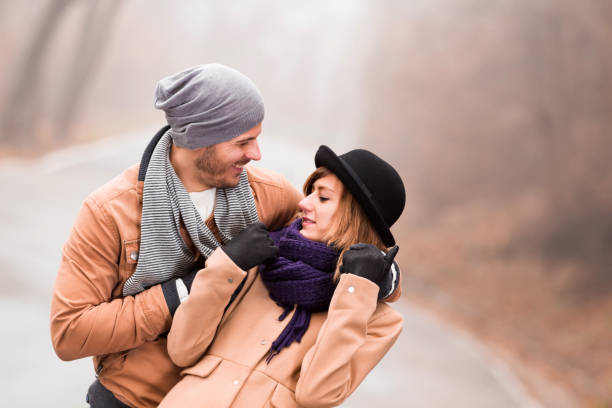 istock Couple enjoying outdoors in cold autumn / winter time. 1193950921