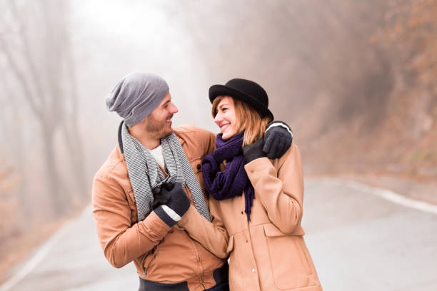 istock Couple enjoying outdoors in cold autumn / winter time. 1193950965