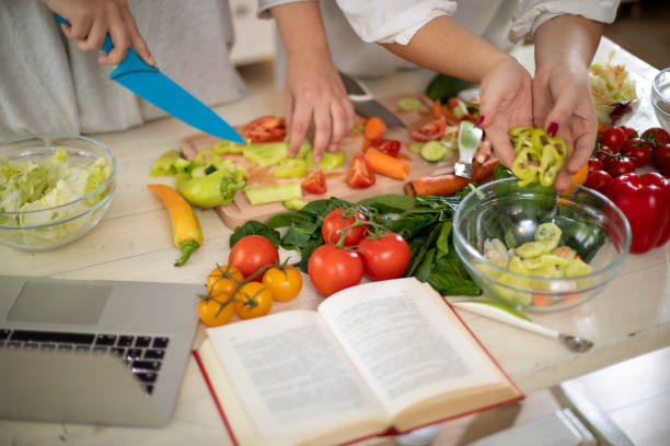 istock Female hands making healthy dinner. 1193951152