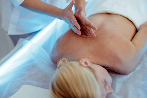 istock Beautiful lady enjoying during back massage at a spa 1193951265