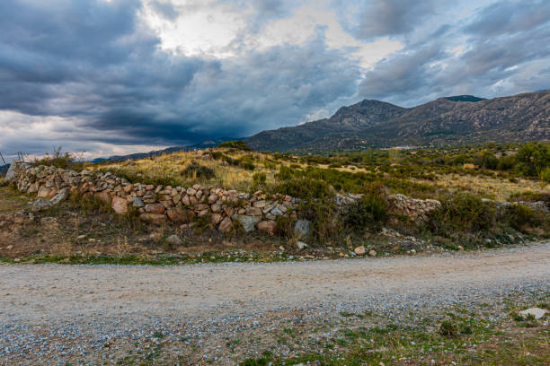 Rural road in Guadarrama sierra. madrid Spain stock photo