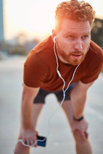 istock Modern young man working out in an urban park. 1193954002