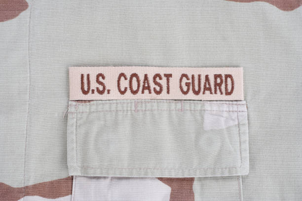 istock US COAST GUARD branch tape on desert camouflage uniform 1193956119