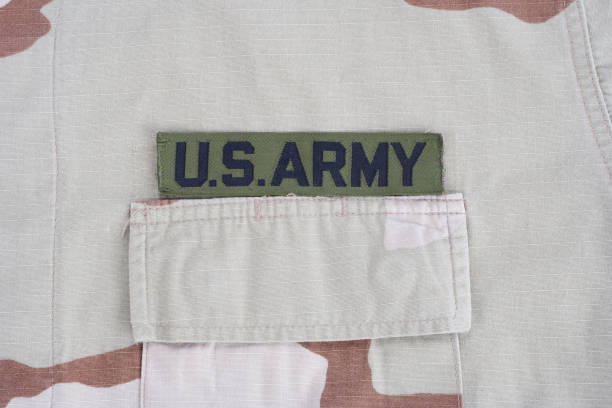 istock US ARMY branch tape on desert camouflage uniform 1193956245