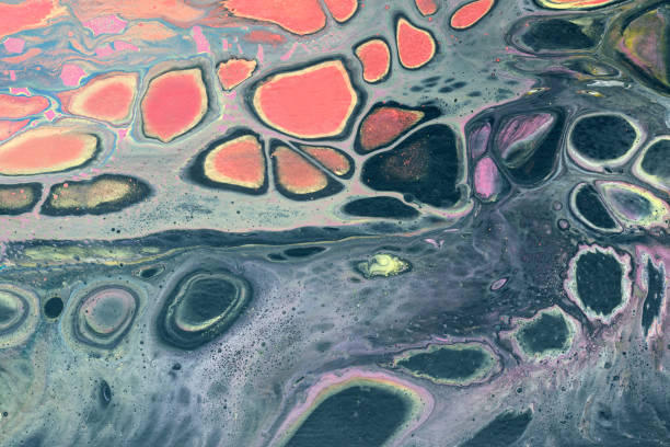istock Creative abstract marbling textured background. Mixing red, black, purple and yellow paints. 1193956273