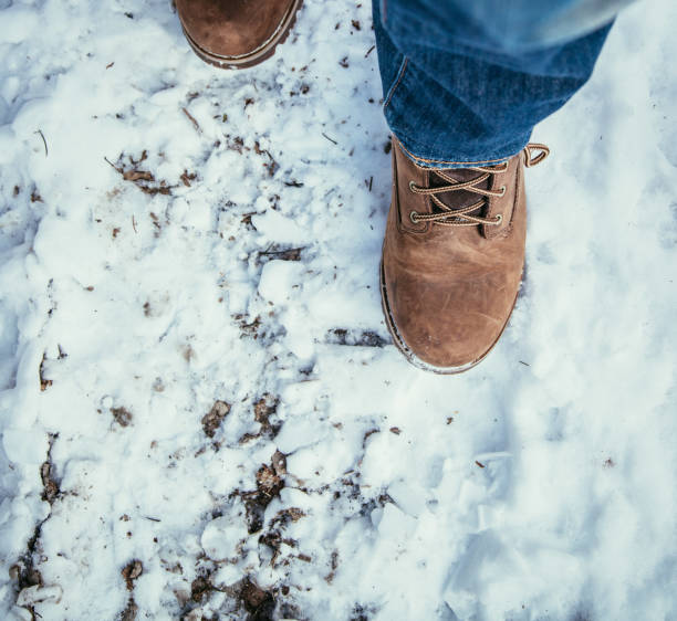 istock Man is walking on snow, wintertime, cut out 1193959577