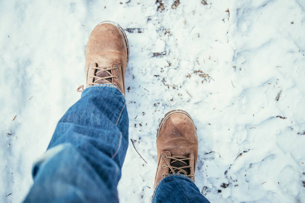 istock Man is walking on snow, wintertime, cut out 1193959598