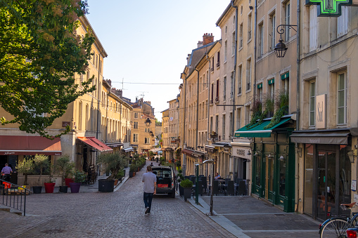 Nancy, France - August 31, 2019: Street view with stores, cafes and restaurants in the old town of Nancy, Lorraine, France