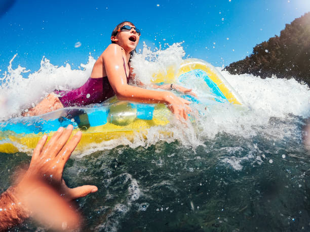 istock Girl having fun floating on the airbed 1193967379