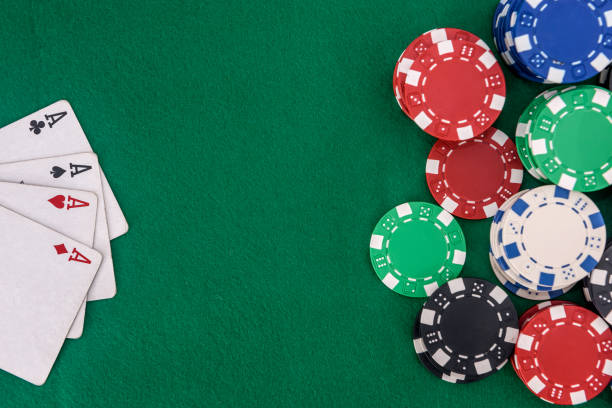 istock Poker chips with playing cards on table for blackjack. Casino and gambling 1193968563