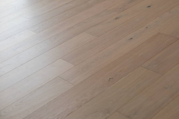 istock Laminate or Parquet floor Installation 1193973060
