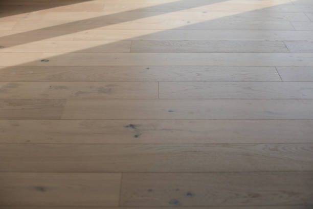 istock Laminate or Parquet floor Installation 1193973061