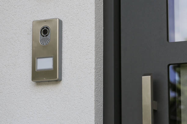 Video intercom on house Video intercom at home entrance next to doors doorbell photos stock pictures, royalty-free photos & images