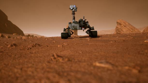 istock A Rover during a dust storm on the red planet. Curiosity Rover on Mars. 3D Rendering 1193974859