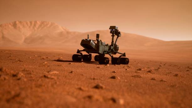 istock A Rover during a dust storm on the red planet. Curiosity Rover on Mars. 3D Rendering 1193974871