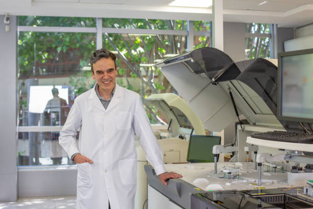 istock Smiling Male Pathologist in Clinical Analysis Laboratory 1193974969