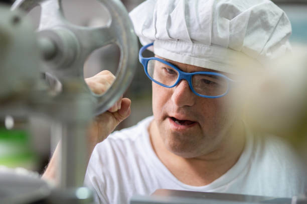 istock Portrait of Hispanic Male Pasta Maker Using Equipment 1193975986