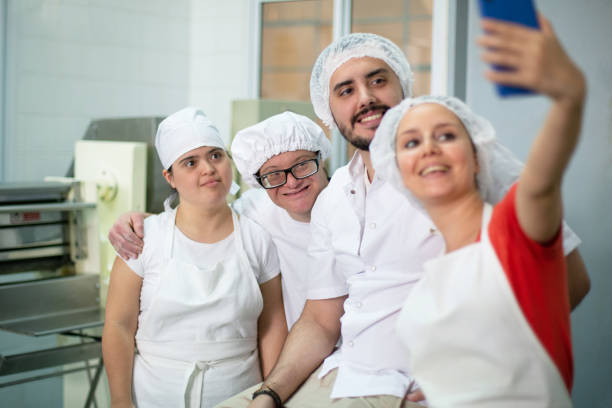 istock Smiling Pasta Makers Taking Selfie in Argentine Factory 1193975989