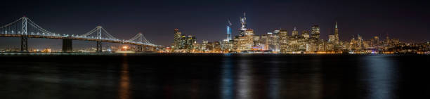 foto panorámica del centro de la ciudad de san francisco por la noche - golden gate bridge san francisco county san francisco bay bay fotografías e imágenes de stock