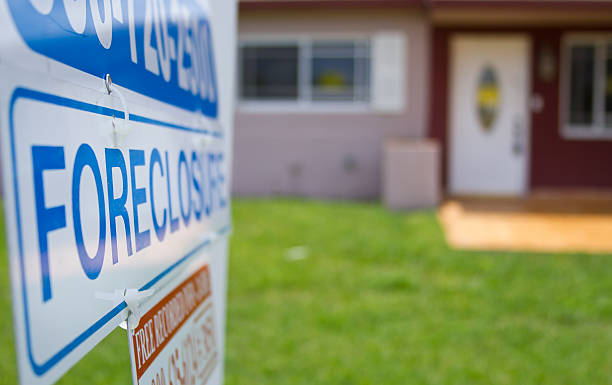 foreclosure sign outside a condemned property  foreclosure stock pictures, royalty-free photos & images